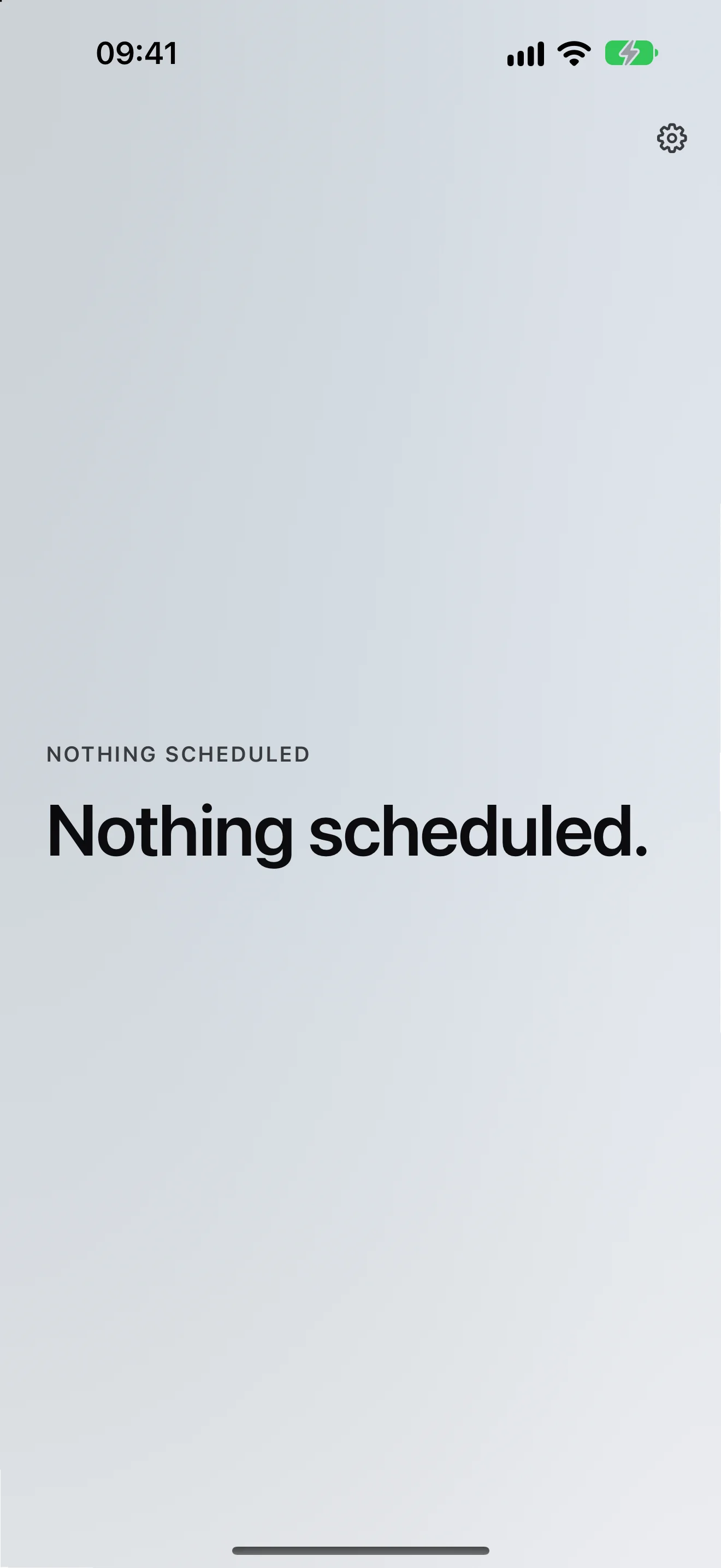 A quiet light-blue field with nothing to report: the words NOTHING SCHEDULED and, below them, “Nothing scheduled.” — an empty calendar is stated in words rather than left as a blank screen.