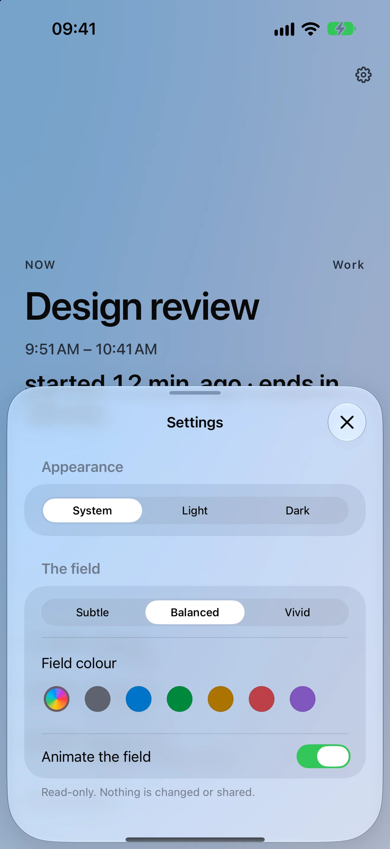 The Upnext settings sheet at half height over the field: Appearance set to System, with Light and Dark beside it; The field section with intensity (Subtle, Balanced, Vivid), a row of seven colour swatches led by a rainbow “follow my calendars” option, and an Animate the field switch; and a footer reading “Read-only. Nothing is changed or shared.”